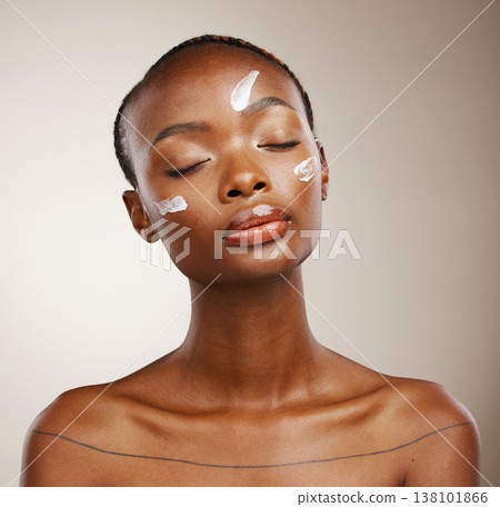 Beauty, self care or black woman with skincare, cream or dermatology on grey studio background. African person, girl or model with creme, aesthetic or cosmetics with luxury grooming and spa treatment 138101866