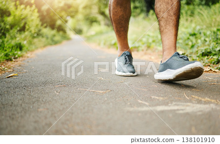 Man, legs and fitness on road for hiking, workout or walking in outdoor exercise or wellness in nature. Closeup of male person, shoes or feet on path for trekking, training or cardio on asphalt Man, legs and fitness on road for hiking, workout or walking in outdoor exercise or wellness in nature. Closeup of male person, shoes or feet on path for trekking, training or cardio on asphalt 138101910