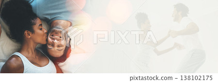 Double exposure, kiss and couple on bed for love and playing together in the morning in a bedroom for happiness. Jumping, care and playful happy man excited with woman in a home with romance 138102175