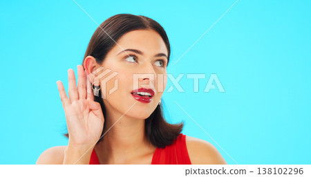 Secret, gossip and woman in blue studio background for beauty and listening. Whisper, frame and privacy with makeup, headshot and isolated for cupping ear, rumour and thinking for spy, emoji or talk 138102296