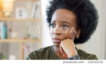 Black woman, stress and thinking in a home with memory and idea in a living room. African female person, anxiety and house with grief, burnout and thoughtful with depression and mental health Black woman, stress and thinking in a home with memory and idea in a living room. African female person, anxiety and house with grief, burnout and thoughtful with depression and mental health 138102581
