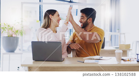 Creative business people, laptop and high five for winning, success or planning together in teamwork at office. Happy man and woman touching hands on touchscreen for team collaboration or achievement 138102588