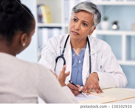 Senior doctor, patient and writing consultation for prescription, diagnosis or notes in checkup at hospital. Mature female person, medical or healthcare filling paperwork or life insurance at clinic 138102910