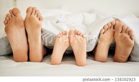 Feet, family and sleeping on bed in bedroom of home together for rest, relax and comfort in the morning. Apartment, mattress and people nap for stress relief, vacation or weekend in san francisco Feet, family and sleeping on bed in bedroom of home together for rest, relax and comfort in the morning. Apartment, mattress and people nap for stress relief, vacation or weekend in san francisco 138102923