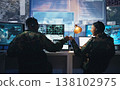 Control room, military and fist bump by soldier team on surveillance together at night for communication. Technology, global and teamwork by security with success on satellite map in army office 138102975