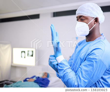 Doctor, man and surgery, put glove on hand and start operation with face mask, PPE and healthcare at hospital. Surgeon ready for treatment, health and medical professional with patient for wellness Doctor, man and surgery, put glove on hand and start operation with face mask, PPE and healthcare at hospital. Surgeon ready for treatment, health and medical professional with patient for wellness 138103023