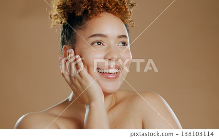 Woman, hand on face with natural beauty and happy with cosmetics and skin glow isolated on brown background. Dermatology, wellness and skincare, model smile for self care and anti aging in studio Woman, hand on face with natural beauty and happy with cosmetics and skin glow isolated on brown background. Dermatology, wellness and skincare, model smile for self care and anti aging in studio 138103114