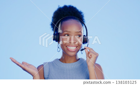 Woman thinking, call center and communication questions in studio for customer service, telemarketing or sales pitch. African consultant, agent or worker ideas, offer or solution on a blue background 138103125