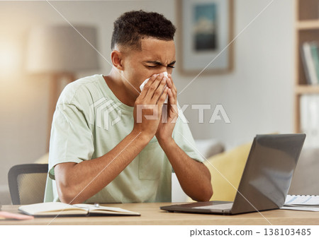 Sneeze, man and tissue in living room with flu, virus or cough while learning online at home. Health, person and fever blow nose with tissue from influenza, illness or cold by table in apartment Sneeze, man and tissue in living room with flu, virus or cough while learning online at home. Health, person and fever blow nose with tissue from influenza, illness or cold by table in apartment 138103485