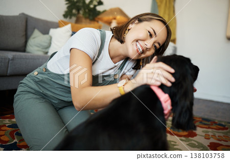 Love, smile and woman with dog in home lounge to relax and play with animal. Pet owner, happy and asian person on floor with companion, care and wellness or friendship and together in cozy apartment Love, smile and woman with dog in home lounge to relax and play with animal. Pet owner, happy and asian person on floor with companion, care and wellness or friendship and together in cozy apartment 138103758