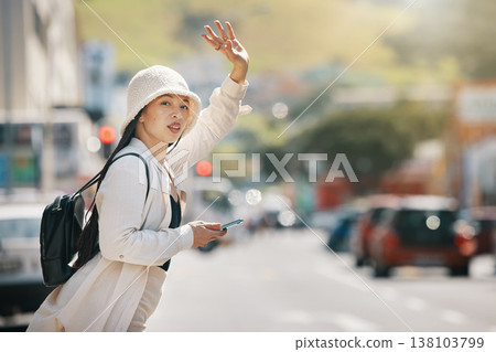 Street, taxi call, and a woman with a phone for contact, an app or communication in the morning. Road, waiting and a girl with a mobile and gesture for transport in city for an urban commute 138103799