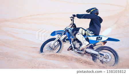 Sports, desert and athlete on bike for fitness, adrenaline and skill training for challenge. Action, dunes and man biker practicing for race, competition or performance adventure at off road rally. 138103812