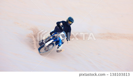 Fast, sand or athlete driving motorbike for action, adventure or fitness with performance or adrenaline. Nature, dirt or sports driver on motorcycle on dunes in training, exercise or race challenge 138103813