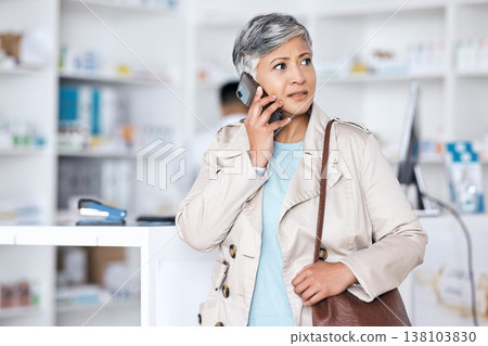 Phone call, pharmacy and shopping with woman in store for search, product and medicine consulting. Communication, healthcare and contact with mature customer for medical, wellness and prescription 138103830