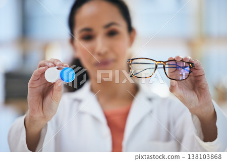 Hands, glasses and contact lens, woman with choice of eye care and help with optometry, vision and healthcare closeup. Doctor, frame and lenses container with decision, advice and ophthalmologist 138103868