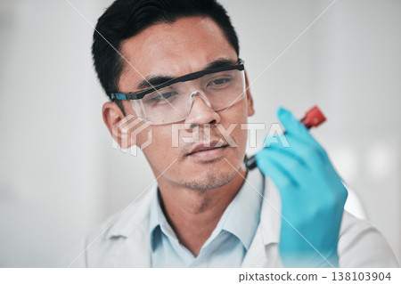 Scientist, face and man with blood test in laboratory for medical investigation, healthcare research and vaccine. Science, asian worker and red tube for dna analysis, development or chemistry results 138103904