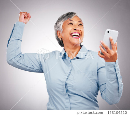 Business woman, wow and phone celebration for success, power and yes with news, bonus or winning in studio. Happy manager or excited winner on mobile for achievement or job goals on white background 138104210