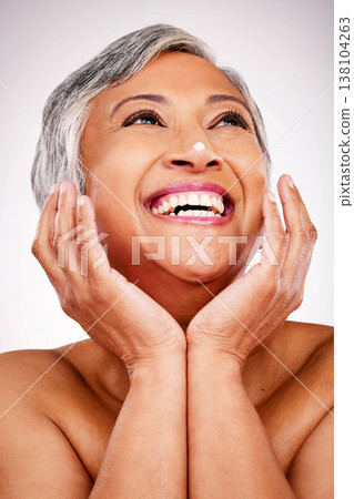 Beauty, face and mature happy woman with cream, ointment or anti aging lotion for skin hydration, protection or treatment. Skincare inspiration, acne cosmetics and studio model on purple background Beauty, face and mature happy woman with cream, ointment or anti aging lotion for skin hydration, protection or treatment. Skincare inspiration, acne cosmetics and studio model on purple background 138104263