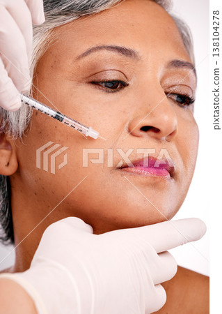 Plastic surgery hands, needle injection or woman face for surgeon augmentation, studio treatment or medical spa wellness. Beauty salon clinic, doctor support or client PRP service on white background Plastic surgery hands, needle injection or woman face for surgeon augmentation, studio treatment or medical spa wellness. Beauty salon clinic, doctor support or client PRP service on white background 138104278