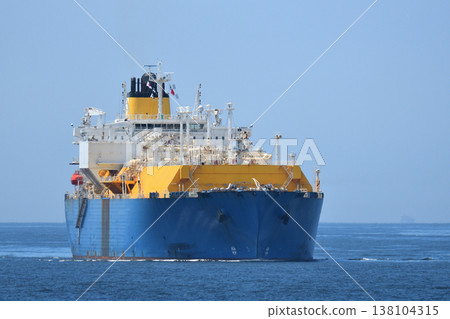 A membrane-type LNG carrier sailing at sea. 138104315
