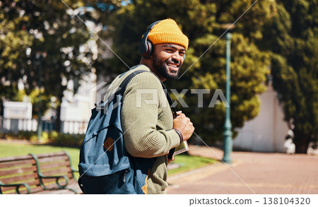 Portrait, outdoor and man with headphones, smile and streaming music with connection, sunshine and listening to audio. Face, person or student with a backpack, headset and podcast with sound or radio Portrait, outdoor and man with headphones, smile and streaming music with connection, sunshine and listening to audio. Face, person or student with a backpack, headset and podcast with sound or radio 138104320