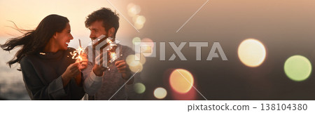 Happy couple, sparkle and love by the beach with mockup space and bokeh with travel and smile. Travel, holiday and anniversary with freedom at sunset by the sea and ocean on vacation with joke Happy couple, sparkle and love by the beach with mockup space and bokeh with travel and smile. Travel, holiday and anniversary with freedom at sunset by the sea and ocean on vacation with joke 138104380