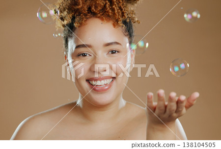 Portrait, skincare and woman with bubbles in studio for beauty in mockup with brown background. Person, model and smile with satisfaction for wellness with treatment, smooth and glow of face Portrait, skincare and woman with bubbles in studio for beauty in mockup with brown background. Person, model and smile with satisfaction for wellness with treatment, smooth and glow of face 138104505