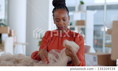 Fashion, designer and black woman with fabric for clothes, textures and pattern in workshop. Retail industry, boutique and person with material for creative startup, small business or store in studio Fashion, designer and black woman with fabric for clothes, textures and pattern in workshop. Retail industry, boutique and person with material for creative startup, small business or store in studio 138104539