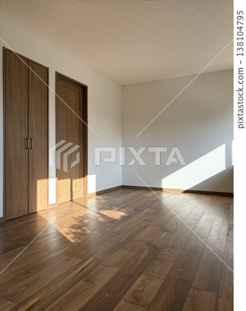 A room with beautiful wood-grain flooring that plays with light and shadow (Real estate, housing advertisement, renovation materials) A room with beautiful wood-grain flooring that plays with light and shadow (Real estate, housing advertisement, renovation materials) 138104795