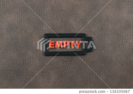 A design of an empty battery, depicted in red. A design of an empty battery, depicted in red. 138105067