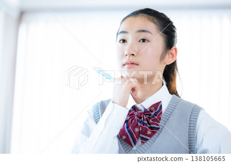 Junior high school girls studying at cram school Junior high school girls studying at cram school 138105665