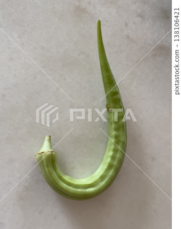 Deformed J Shape Okra Abelmoschus Esculentus On White Background Deformed J Shape Okra Abelmoschus Esculentus On White Background 138106421