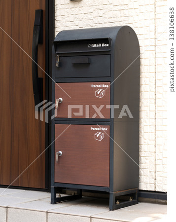 Delivery box and mailbox at the entrance of a house Delivery box and mailbox at the entrance of a house 138106638