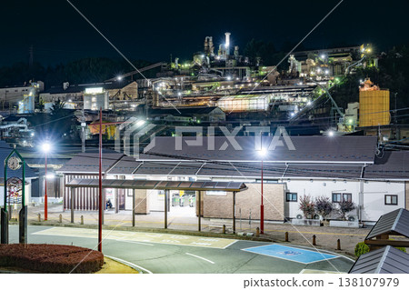 A massive factory night view spread across a hillside (Annaka City, Gunma Prefecture) 138107979