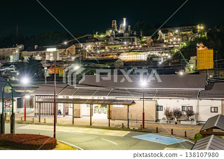 A massive factory night view spread across a hillside (Annaka City, Gunma Prefecture) 138107980