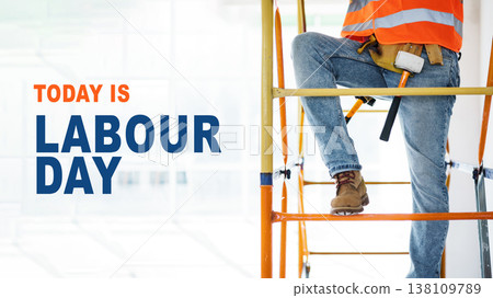 Workers celebrate International Workers Day while on scaffolding at a construction site Workers celebrate International Workers Day while on scaffolding at a construction site 138109789