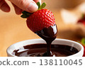 Fresh strawberry dipped in rich chocolate sauce close-up 138110045