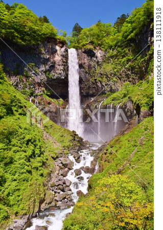 Kegon Falls in Oku-Nikko, surrounded by lush greenery. Kegon Falls in Oku-Nikko, surrounded by lush greenery. 138111918