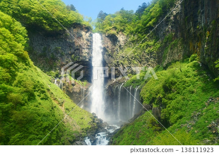 Kegon Falls in Oku-Nikko, surrounded by lush greenery. Kegon Falls in Oku-Nikko, surrounded by lush greenery. 138111923