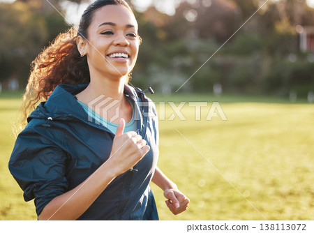 Fitness field, smile and woman running for outdoor exercise, cardio workout or training for park marathon race. Sports warm up, nature freedom or morning runner doing athlete challenge on grass pitch 138113072