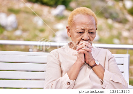 Mature, woman and alone with face in worry for future, retirement or rehabilitation at nursing home. Black, elderly and person in prayer for wellness, diagnosis or treatment at hospital for health 138113135
