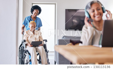 Tablet, wheelchair and assisted living caregiver with a patient in her retirement home for care. Technology, healthcare and black woman nurse helping a senior with a disability for medical support Tablet, wheelchair and assisted living caregiver with a patient in her retirement home for care. Technology, healthcare and black woman nurse helping a senior with a disability for medical support 138113136