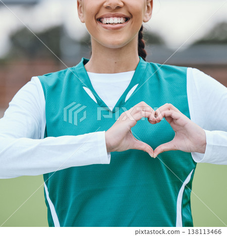 Sports, heart hands or happy athlete on field for fitness, exercise or workout for cardiovascular health. Love sign, hand gesture or healthy woman in a training game for wellness or hockey practice Sports, heart hands or happy athlete on field for fitness, exercise or workout for cardiovascular health. Love sign, hand gesture or healthy woman in a training game for wellness or hockey practice 138113466