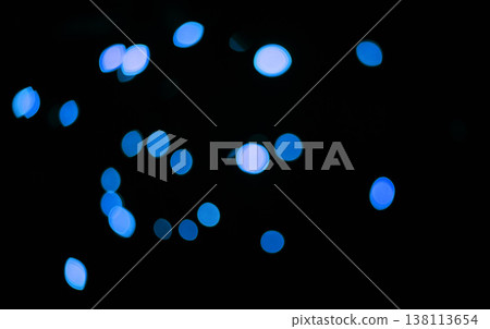 Blue, confetti and bokeh in a studio with dark background for celebration, event or party. Lights, glitter and color sparkles for magic, shine or glow for festive by black backdrop with mockup. Blue, confetti and bokeh in a studio with dark background for celebration, event or party. Lights, glitter and color sparkles for magic, shine or glow for festive by black backdrop with mockup. 138113654