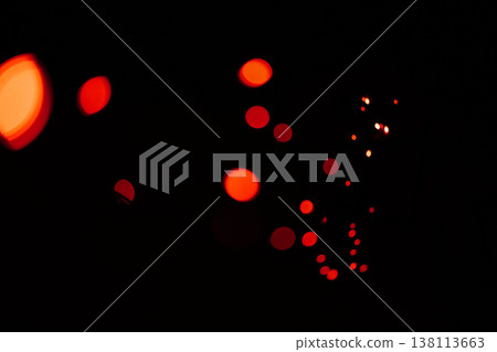 Bokeh, red lights and dark wallpaper with pattern, texture and mockup with cosmic dots aesthetic. Night lighting, sparkle particles and glow on black background with space, color shine and flare. Bokeh, red lights and dark wallpaper with pattern, texture and mockup with cosmic dots aesthetic. Night lighting, sparkle particles and glow on black background with space, color shine and flare. 138113663
