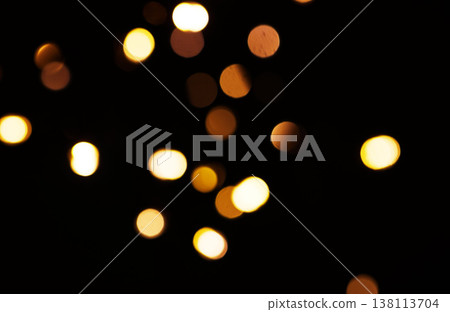Gold, light and mockup with bokeh on dark background for New Year, Christmas or festive fireworks celebration at night. Mock up, space or sparkle in winter with magic, glow or shine on black backdrop 138113704