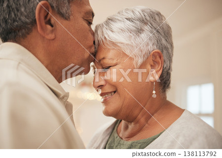 Old couple, man kiss woman on forehead with love and bonding at home, love and life partner in marriage with peace. Commitment, trust and support with people in retirement, affection and romance Old couple, man kiss woman on forehead with love and bonding at home, love and life partner in marriage with peace. Commitment, trust and support with people in retirement, affection and romance 138113792