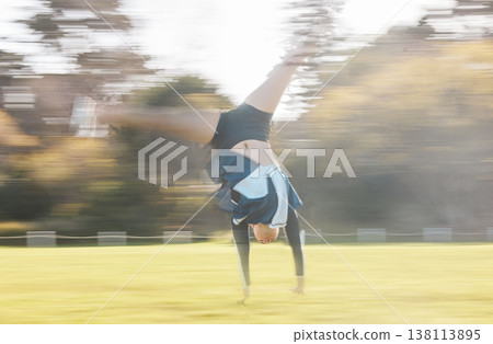 Cheerleader routine, cartwheel and field person exercise, action and training for sports competition, dance or contest. Cheerleading, fast motion blur and dancer performance, practice or rehearsal 138113895