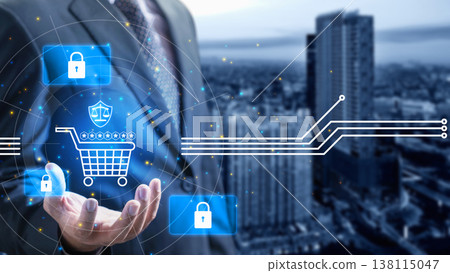 A businessman in a suit holds a digital projection of a shopping cart, security locks, and legal shield icons against a blurred urban city backdrop 138115047