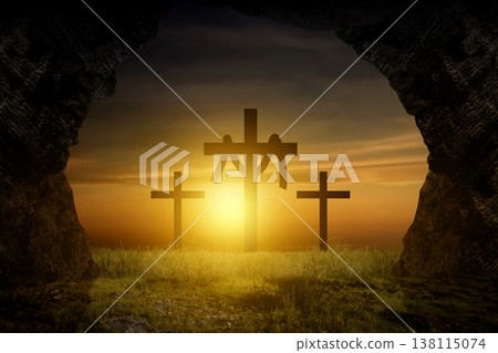 View from an empty tomb looking out at three crosses on a hill during a golden sunrise, symbolizing the resurrection of Jesus Christ on Easter morning View from an empty tomb looking out at three crosses on a hill during a golden sunrise, symbolizing the resurrection of Jesus Christ on Easter morning 138115074